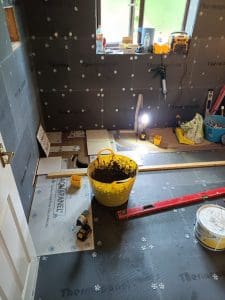 Flooring the space ready for bathroom tiles11