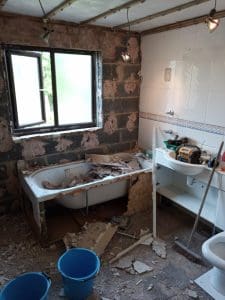 Flooring the space ready for bathroom tiles3