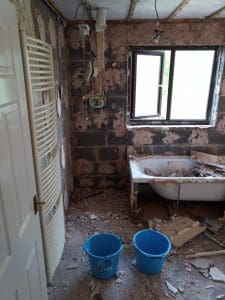 Flooring the space ready for bathroom tiles5
