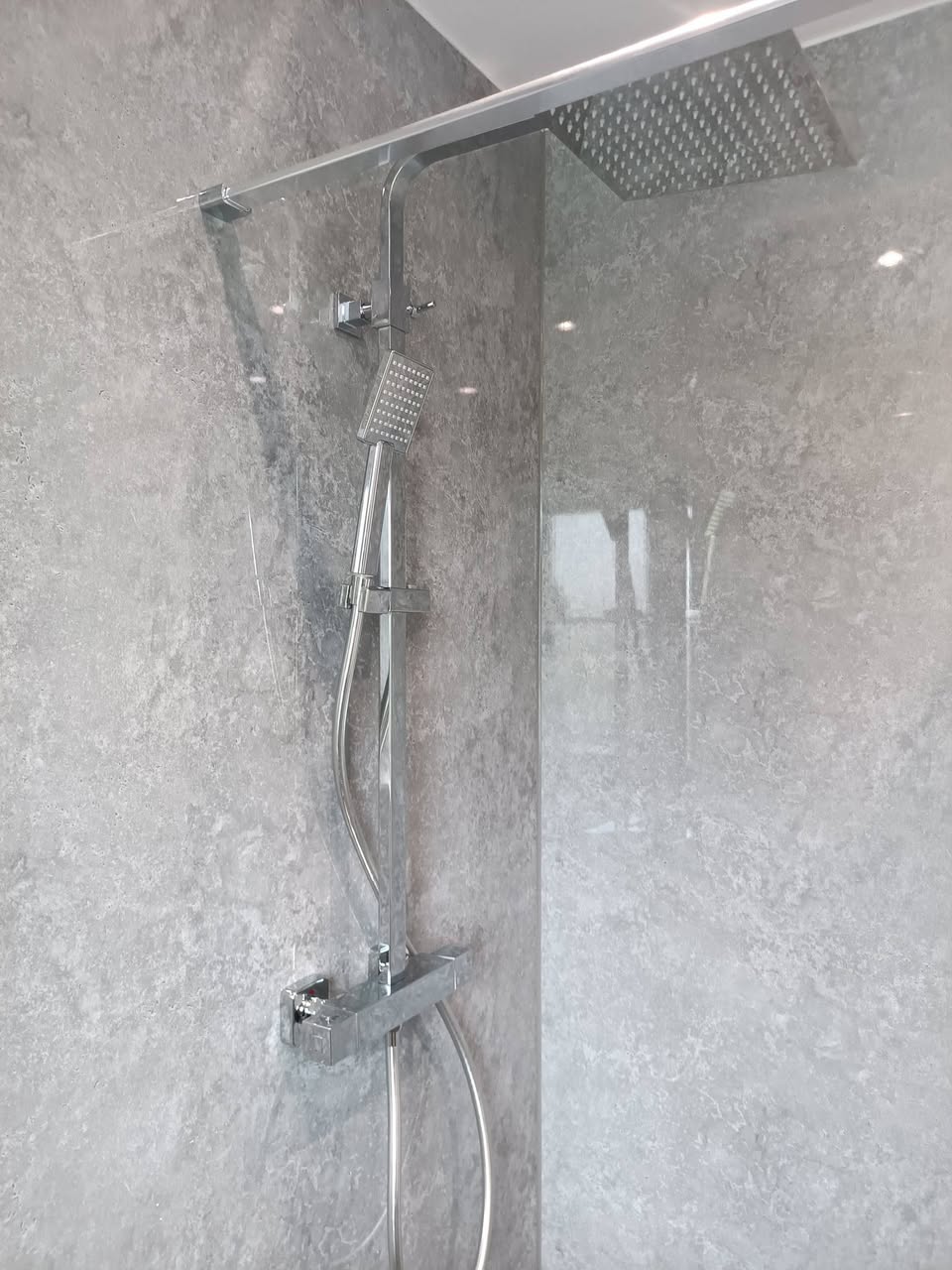 wall-mounted-shower-head-modern-bathroom.jpg